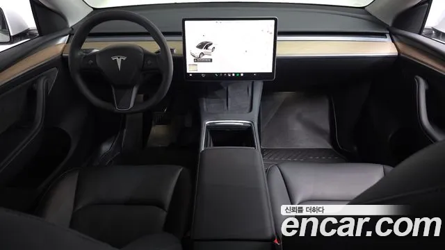 Tesla Model Y — Фото автомобиля 10
