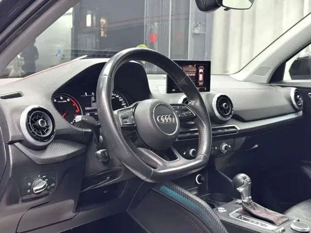 Audi Q2L — Фото автомобиля 5