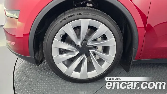 Tesla Model Y — Фото автомобиля 5