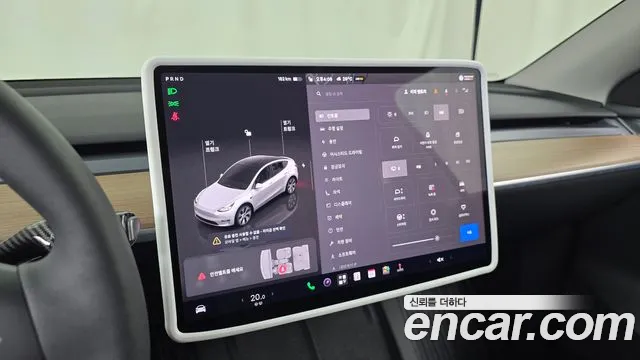 Tesla Model Y — Фото автомобиля 16