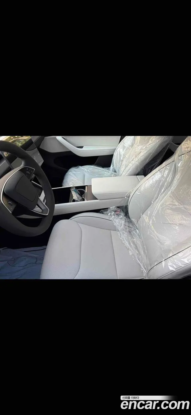 Tesla Model Y — Фото автомобиля 4