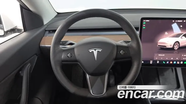 Tesla Model Y — Фото автомобиля 11