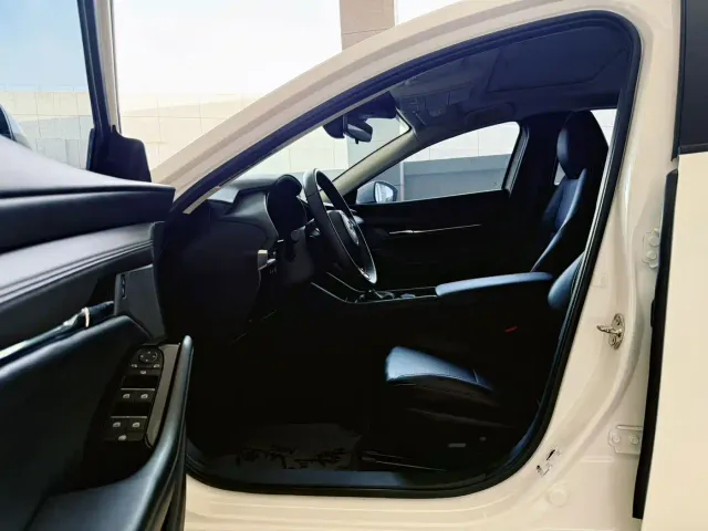 Mazda Axela — Фото автомобиля 7