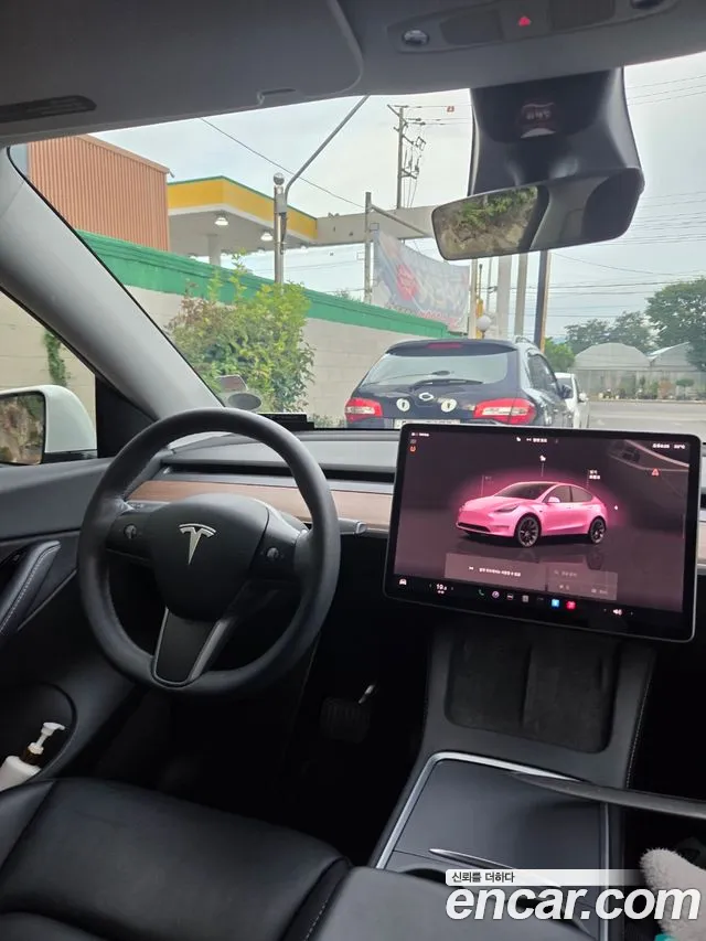 Tesla Model Y — Фото автомобиля 7