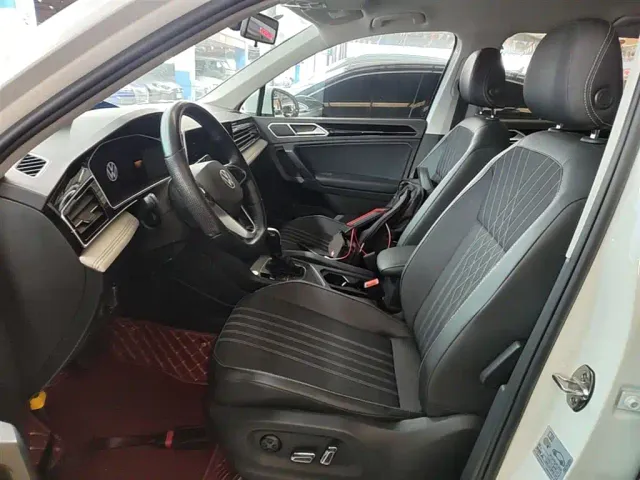 Volkswagen Tiguan L — Фото автомобиля 14