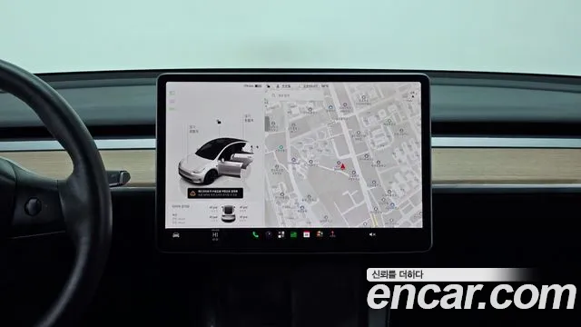 Tesla Model Y — Фото автомобиля 19