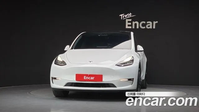 Tesla Model Y — Фото автомобиля 3