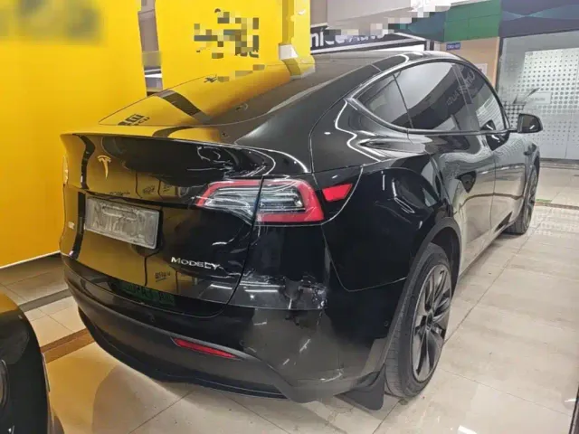 Tesla Model Y — Фото автомобиля 6