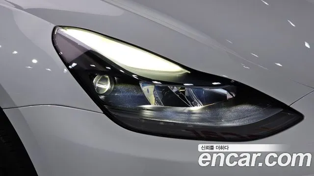 Tesla Model Y — Фото автомобиля 7