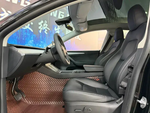 Tesla Model Y — Фото автомобиля 8