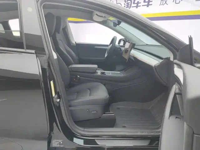 Tesla Model Y — Фото автомобиля 8