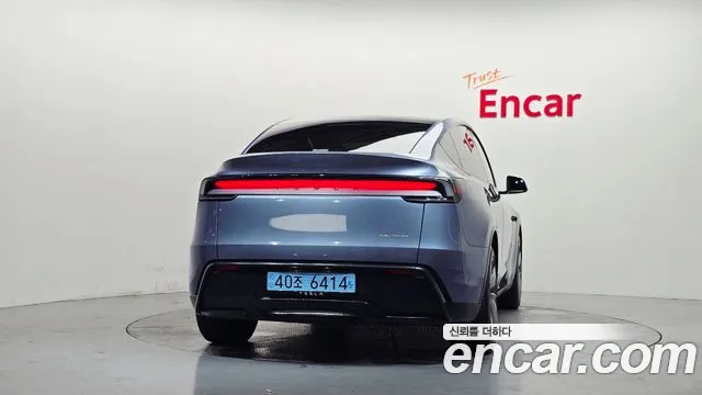 Tesla Model Y — Фото автомобиля 4