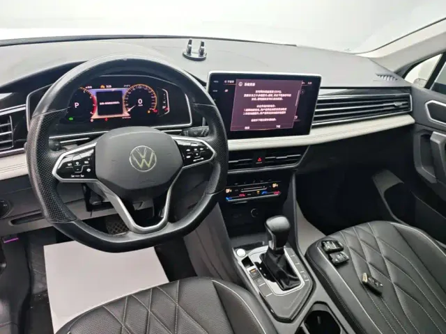 Volkswagen Tiguan L — Фото автомобиля 9