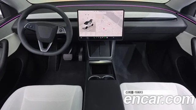 Tesla Model Y — Фото автомобиля 9