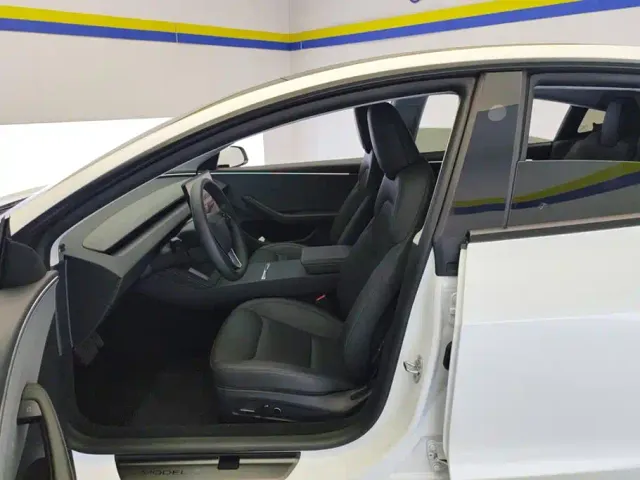 Tesla Model 3 — Фото автомобиля 9
