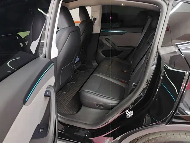 Tesla Model Y — Фото автомобиля 16