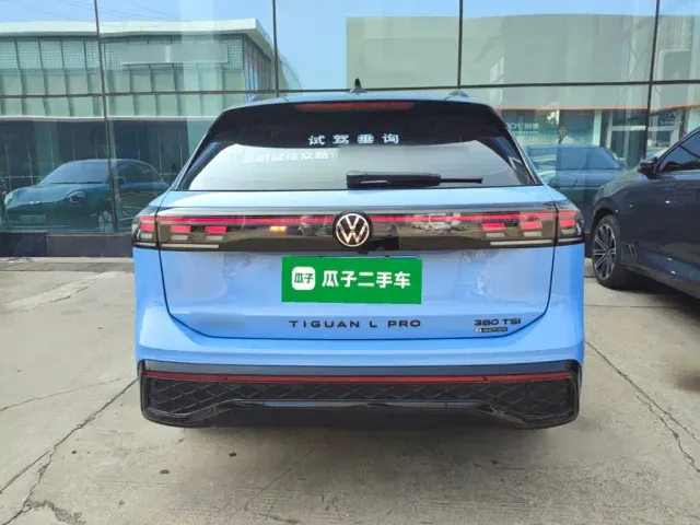 Volkswagen Tiguan L — Фото автомобиля 5