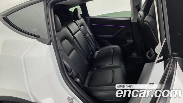 Tesla Model Y — Фото автомобиля 17