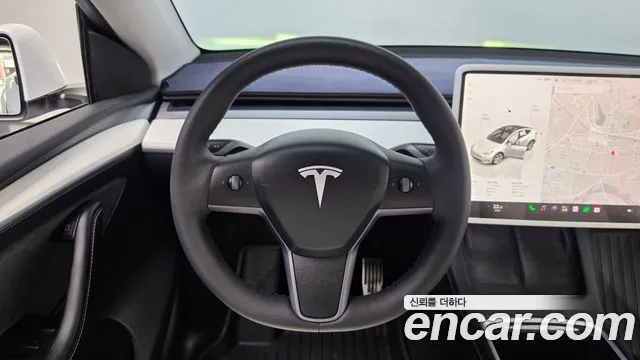 Tesla Model Y — Фото автомобиля 19
