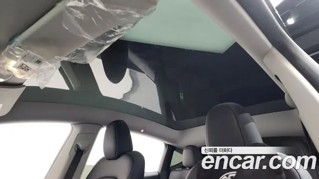 Tesla Model Y — Фото автомобиля 22
