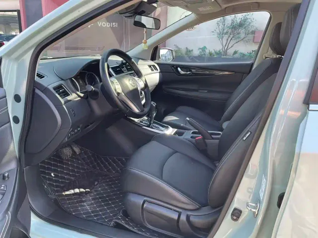 Nissan Tiida — Фото автомобиля 4