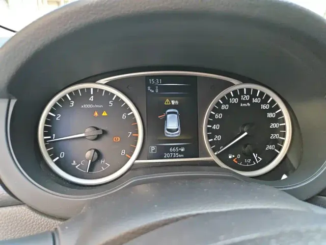 Nissan Tiida — Фото автомобиля 12