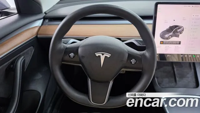 Tesla Model 3 — Фото автомобиля 21