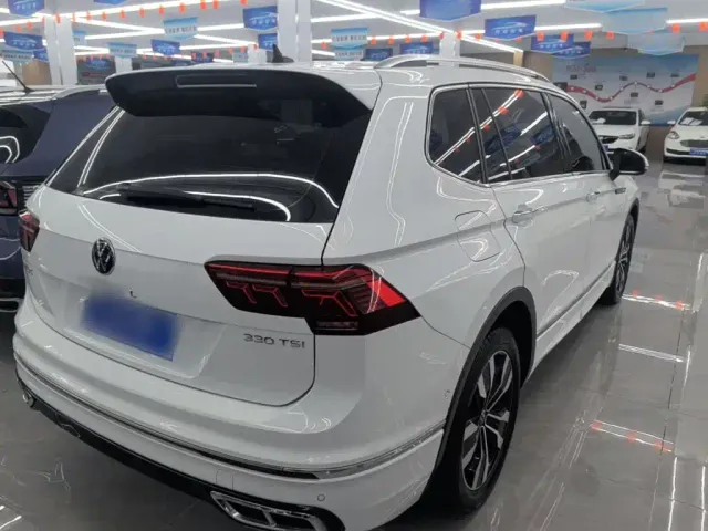 Volkswagen Tiguan L — Фото автомобиля 6