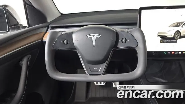 Tesla Model Y — Фото автомобиля 19