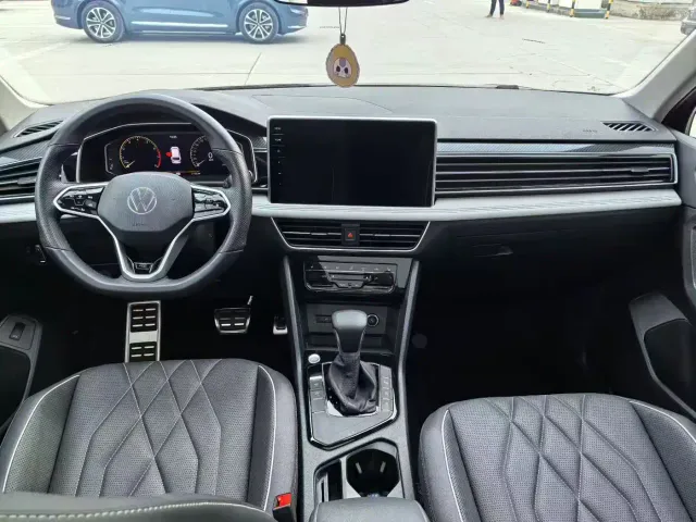 Volkswagen Tiguan L — Фото автомобиля 5