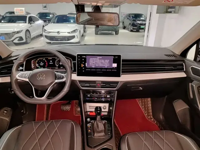 Volkswagen Tiguan L — Фото автомобиля 10