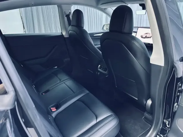 Tesla Model Y — Фото автомобиля 9