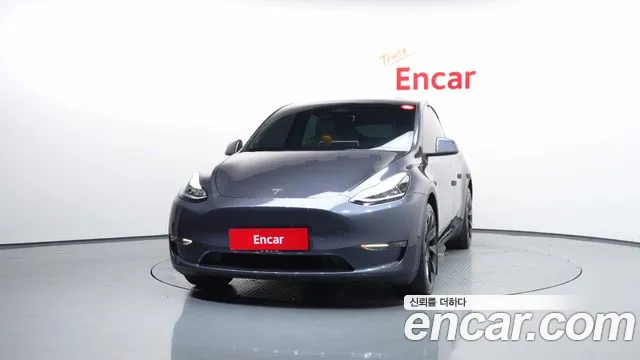 Tesla Model Y — Фото автомобиля 3