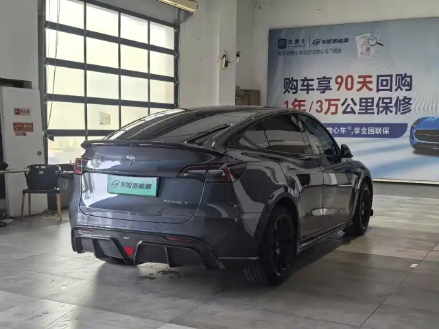 Tesla Model Y — Фото автомобиля 7
