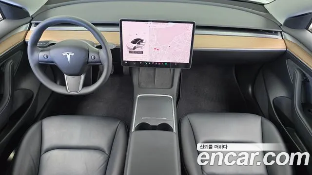 Tesla Model 3 — Фото автомобиля 10