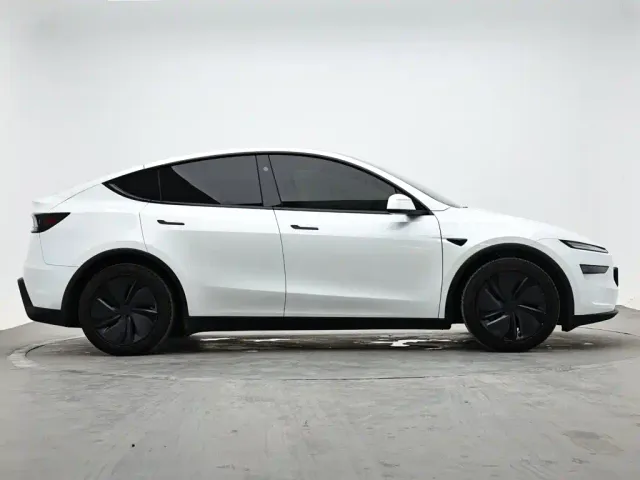Tesla Model Y — Фото автомобиля 5