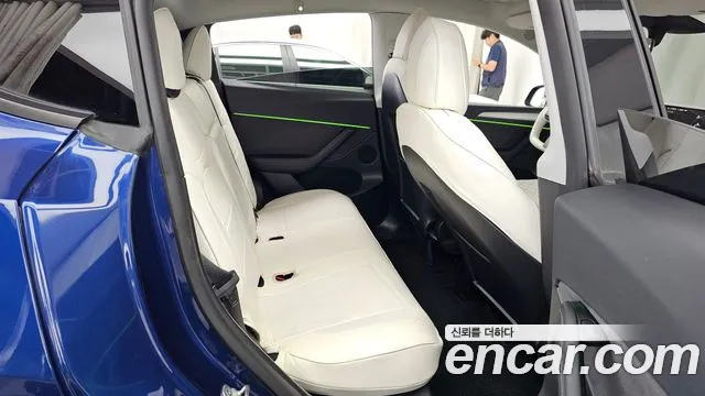Tesla Model Y — Фото автомобиля 11