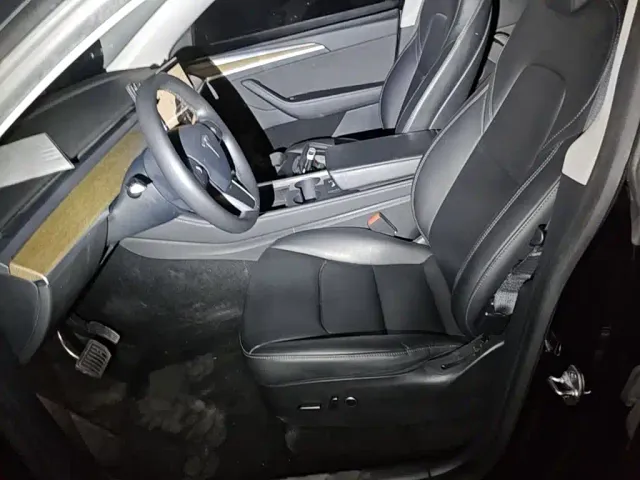 Tesla Model Y — Фото автомобиля 14