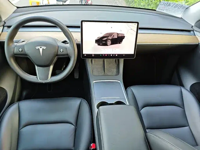 Tesla Model Y — Фото автомобиля 9
