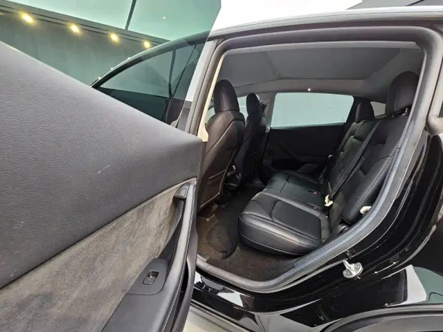 Tesla Model Y — Фото автомобиля 22