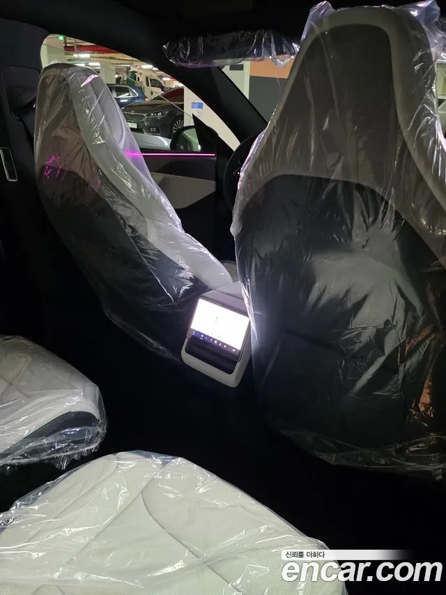 Tesla Model Y — Фото автомобиля 6