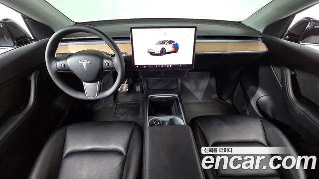 Tesla Model Y — Фото автомобиля 7