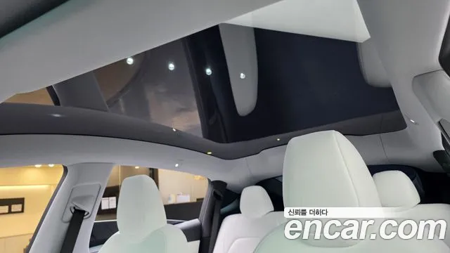 Tesla Model Y — Фото автомобиля 24