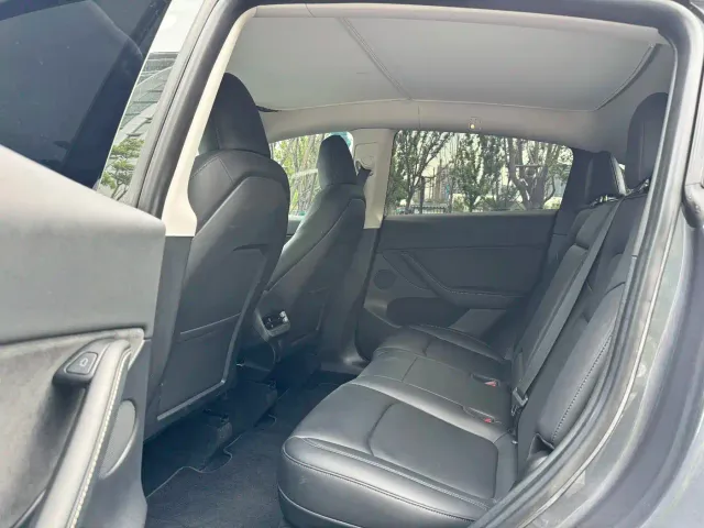 Tesla Model Y — Фото автомобиля 9