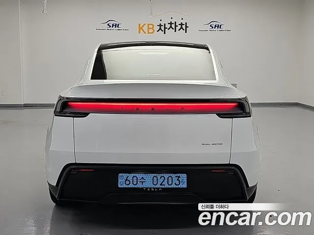 Tesla Model Y — Фото автомобиля 4