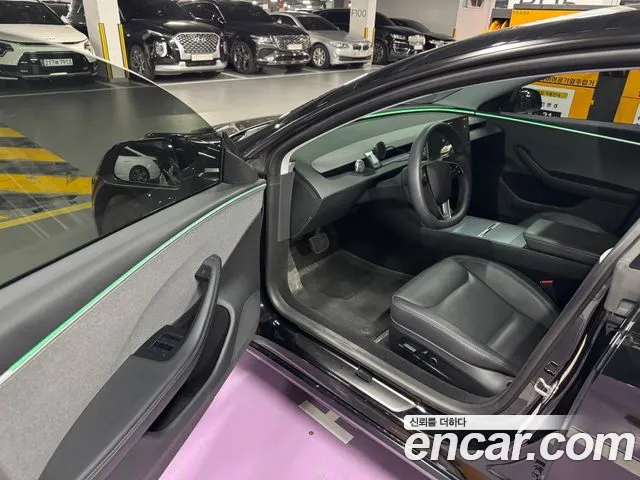 Tesla Model 3 — Фото автомобиля 17