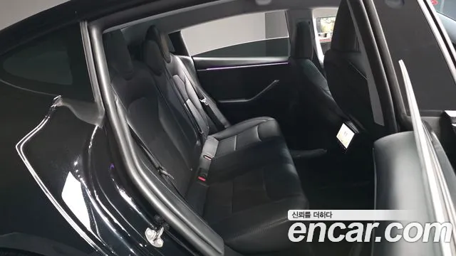 Tesla Model 3 — Фото автомобиля 12