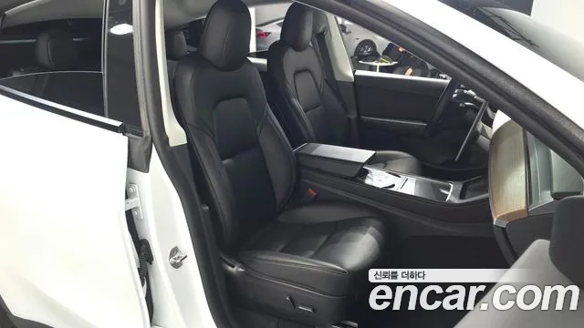 Tesla Model Y — Фото автомобиля 16
