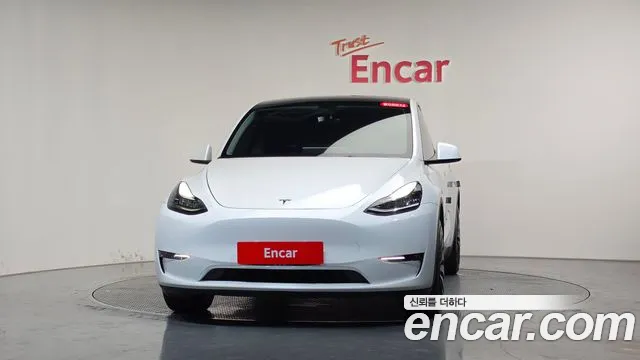 Tesla Model Y — Фото автомобиля 3
