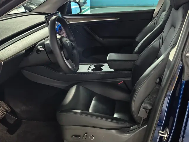Tesla Model Y — Фото автомобиля 8